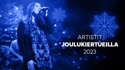 Artistit joulukiertueilla - artistien joulukonsertit - kuvassa naislaulaja ja lumihiutaleita